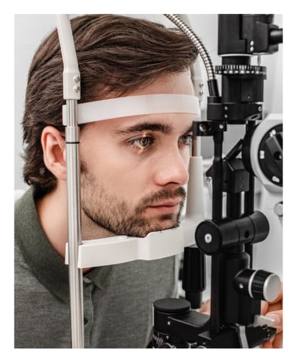 Man undergoing eye exam at Big City Optical