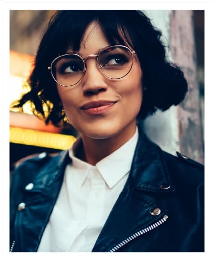 Stylish woman wearing fashionable eyeglasses.
