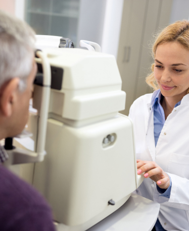 Man checking eyeglasses at Big City Optical<br />
