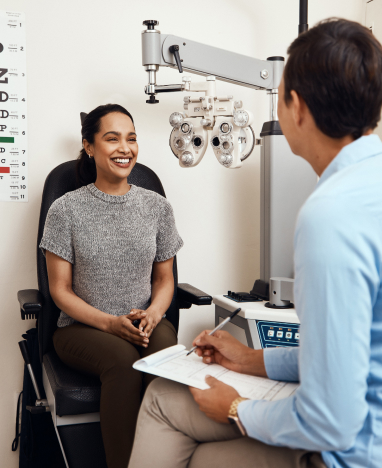 Man checking eyeglasses at Big City Optical<br />
