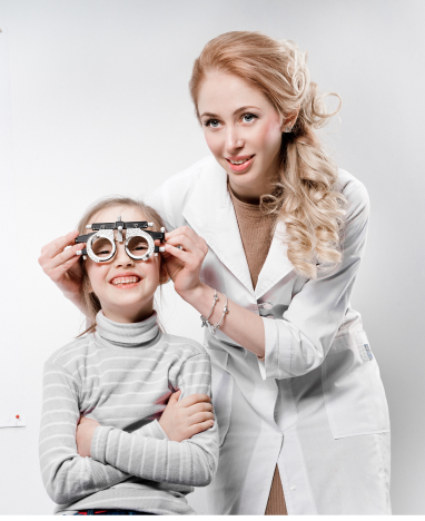 Man checking eyeglasses at Big City Optical<br />
