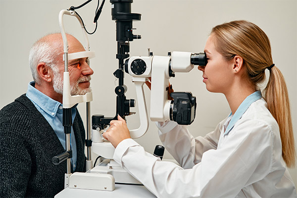 Old patient getting a contact lens exam at BCO