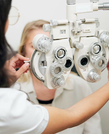 Man checking eyeglasses at Big City Optical<br />
