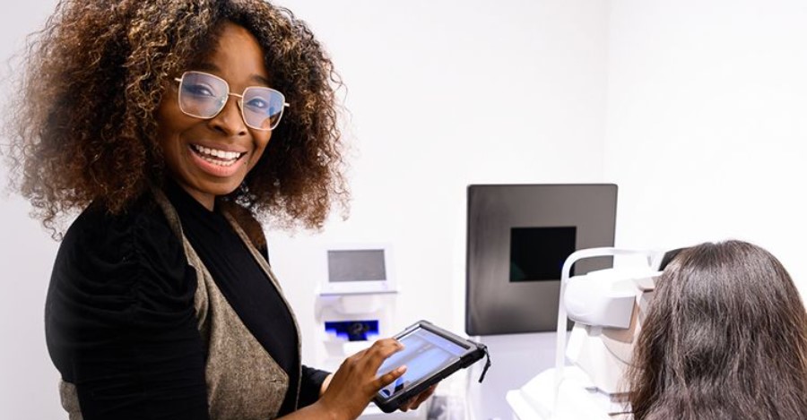 Woman getting her eyes checked at Big City Optical.