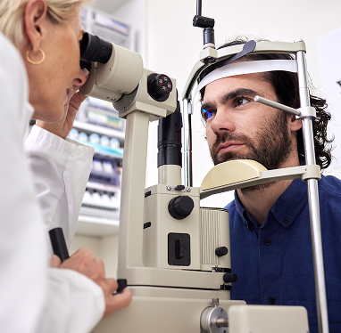 Woman waving hello while holding a flower